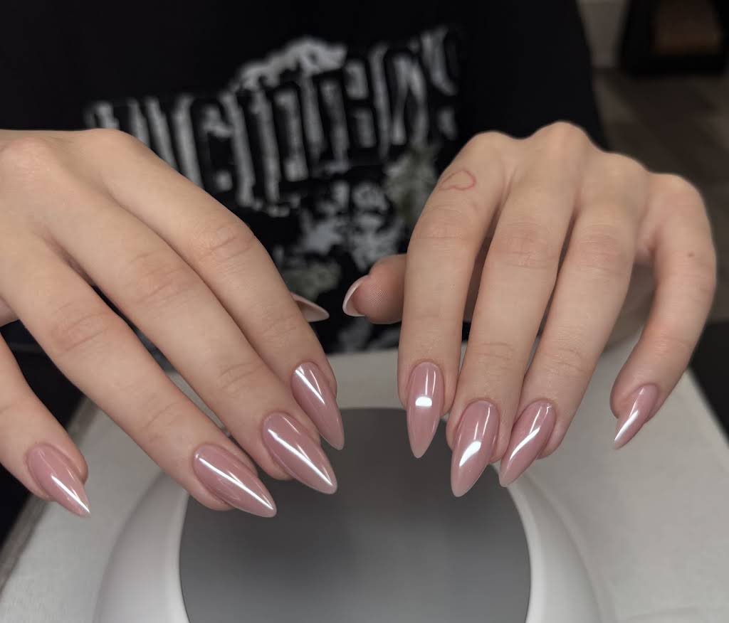 Glossy nude almond manicure