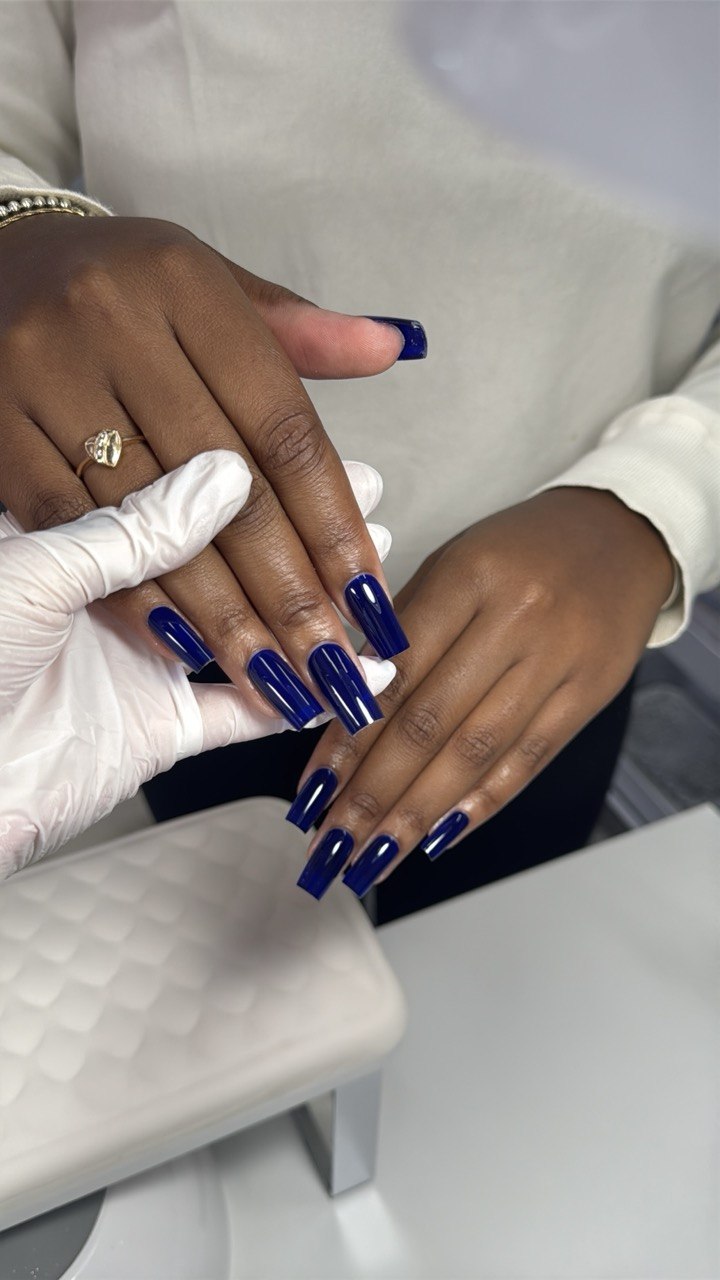 Long glossy blue Gel-X extensions