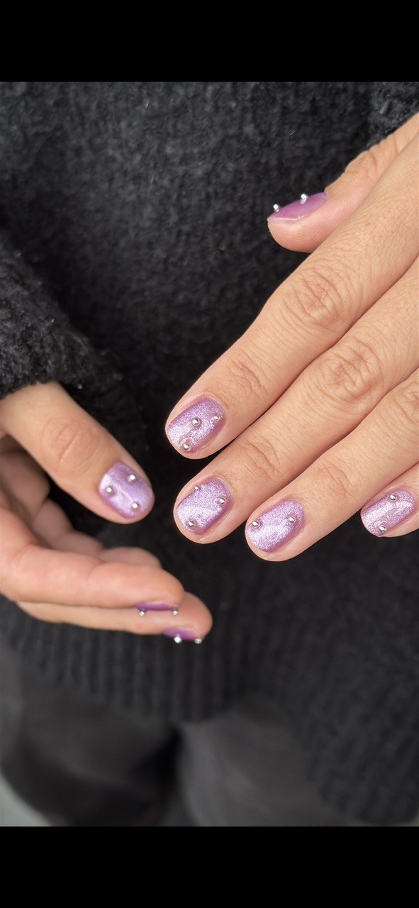 Pink shimmer regular-base manicure with small crystals